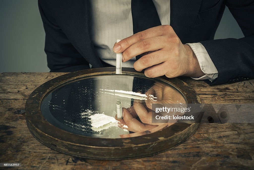 Someone Snorting Businessman Snorting Cocaine High-Res Stock Photo - Getty Images