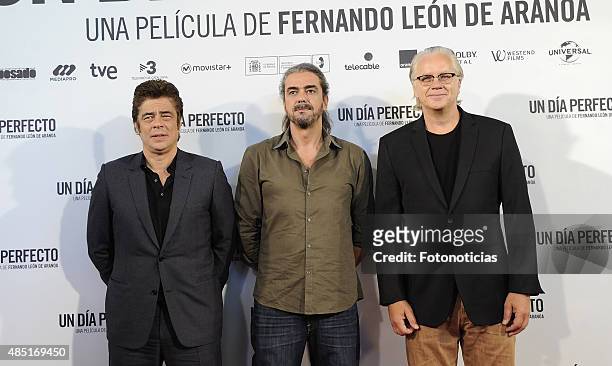 Director Fernando Leon de Aranoa Benicio del Toro and Tim Robbins attend a photocall for 'A Perfect Day' at the Villamagna Hotel on August 25, 2015...