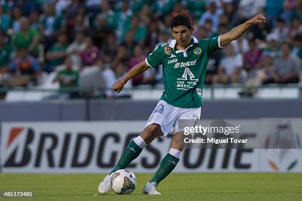 Jonny Magallan of Leon drives the ball during a second round match between Leon and Bolivar as part of the Copa Bridgestone Libertadores 2014 at...