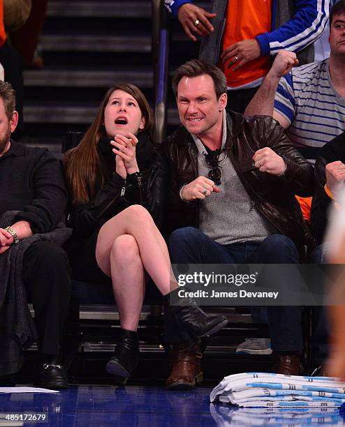 Christian Slater and daughter Eliana Sophia attend the Toronto Raptors vs New York Knicks game at Madison Square Garden on April 16, 2014 in New York...