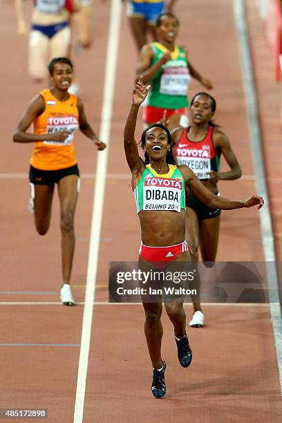 Genzebe Dibaba of Ethiopia crosses the finish line to win gold in the Women's 1500 metres final during day four of the 15th IAAF World Athletics...