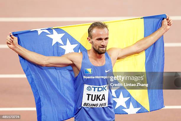 Amel Tuka of Bosnia and Herzegovina celebrates after winning bronze in the Men's 800 metres final during day four of the 15th IAAF World Athletics...