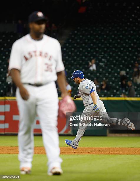 Mike Moustakas of the Kansas City Royals hits a solo home run to take the lead in the 11th inning against Jerome Williams of the Houston Astros at...