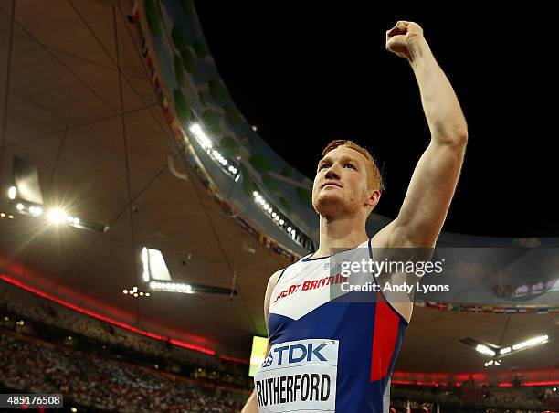 Greg Rutherford of Great Britain celebrates after winning gold in the Men's Long Jump final during day four of the 15th IAAF World Athletics...