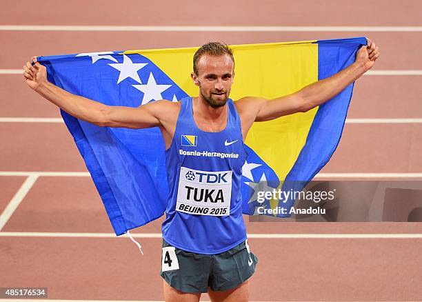 Amel Tuka of Bosnia and Herzegovina celebrates after winning the bronze medal in the Men's 800 metres final during the '15th IAAF World Athletics...