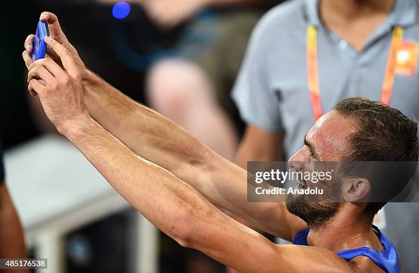 Amel Tuka of Bosnia and Herzegovina celebrates after winning the bronze medal in the Men's 800 metres final during the '15th IAAF World Athletics...