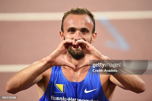 Amel Tuka of Bosnia and Herzegovina celebrates after winning the bronze medal in the Men's 800 metres final during the '15th IAAF World Athletics...