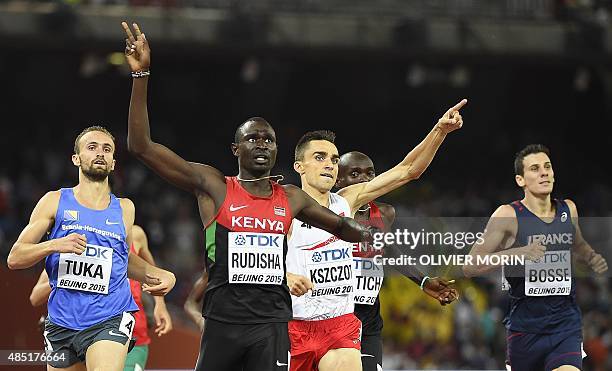 Kenya's David Lekuta Rudisha reacts as he wins in front Bosnia-Herzegovina's Amel Tuka and Poland's Adam Kszczot during the final of the men's 800...