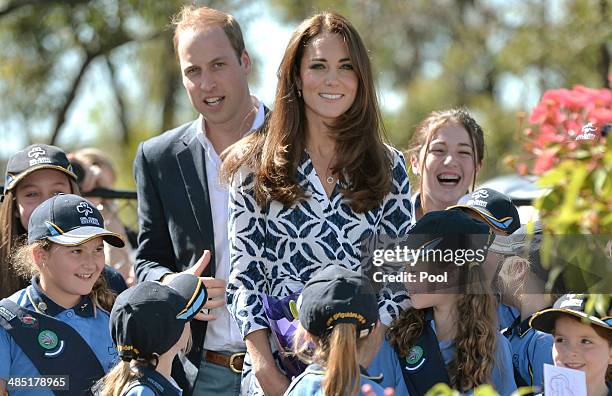 Prince William, Duke of Cambridge and Catherine, Duchess of Cambridge pose with Winmalee Girl Guides after planting a Summer Red Eucalyptus tree at...