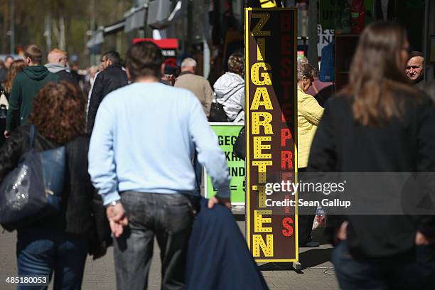Visitors shop for cigarettes and other items that are cheaper than in Germany at an outdoor market near the German-Polish border on April 16, 2014 in...