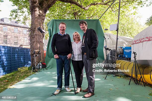 Scottish musician and producer Edwyn Collins, Grace Maxwell and Ian Rankin attend a photocall at Edinburgh International Book Festival on August 25,...