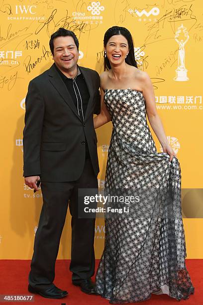 Chinese actress Gong Beibi and her husband diretor Dayyan Eng arrive for the red carpet of 4th Beijing International Film Festival at China's...