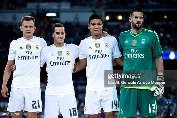 Real Madrid players coming form the reserve Denis Cheryshev , Lucas Vazquez , Carlos Casemiro and goalkeeper Francisco alias Kiko Casilla pose for...