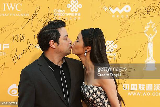 Chinese actress Gong Beibi and her husband diretor Dayyan Eng arrive for the red carpet of 4th Beijing International Film Festival at China's...