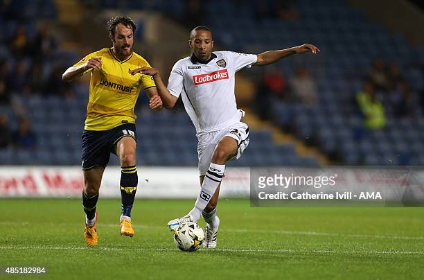 Danny Hylton of Oxford United and Thierry Audel of Notts County during the Sky Bet League Two match between Oxford United and Notts County at Kassam...