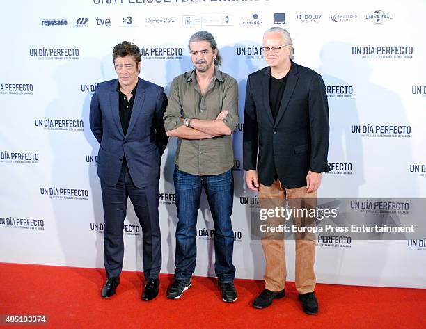 Benicio del Toro, director Fernando Leon de Aranoa and Tim Robbins attend 'A perfect day' photocall on August 25, 2015 in Madrid, Spain.