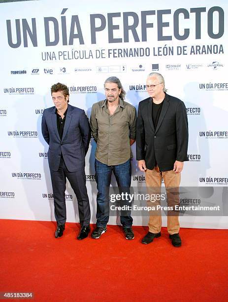 Benicio del Toro, director Fernando Leon de Aranoa and Tim Robbins attend 'A perfect day' photocall on August 25, 2015 in Madrid, Spain.