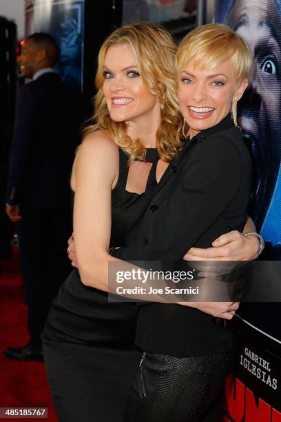 Missi Pyle and Jaime Pressly walk the "A Haunted House 2" Los Angeles Premiere Red Carpet at Regal Cinemas L.A. Live on April 16, 2014 in Los...