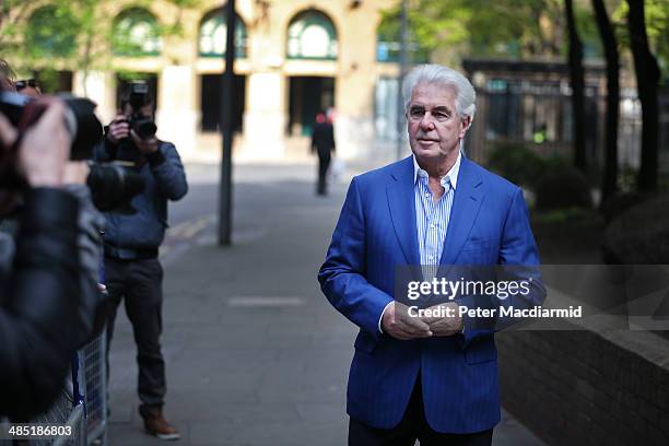 Publicist Max Clifford arrives at Southwark Crown Court on April 17, 2014 in London, England. The jury has retired to consider the 11 charges of...