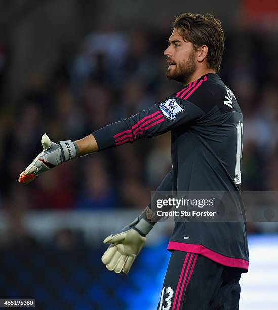 Swansea goalkeeper Kristoffer Nordfeldt in action during the Capital One Cup Second Round match between Swansea City and York City at Liberty Stadium...