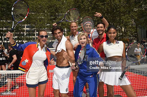 Hannah Davis, Akin Akman, Constance Jablonski, Jane Lynch, Arthur Kulkov, Noah Mills and Chanel Iman pose at the Tommy Hilfiger and Rafael Nadal...