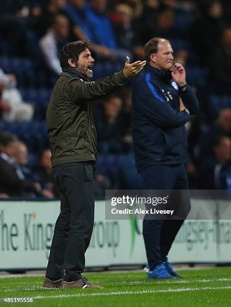 Quique Flores, manager of Watford looks on during the Capital One Cup Second Round match between Preston North End and Watford at Deepdale on August...