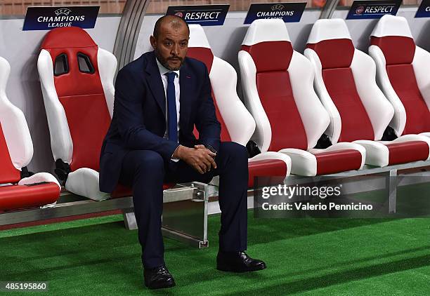 Valencia head coach Nuno Espirito Santo sits on the bench during the UEFA Champions League qualifying round play off second leg match between Monaco...