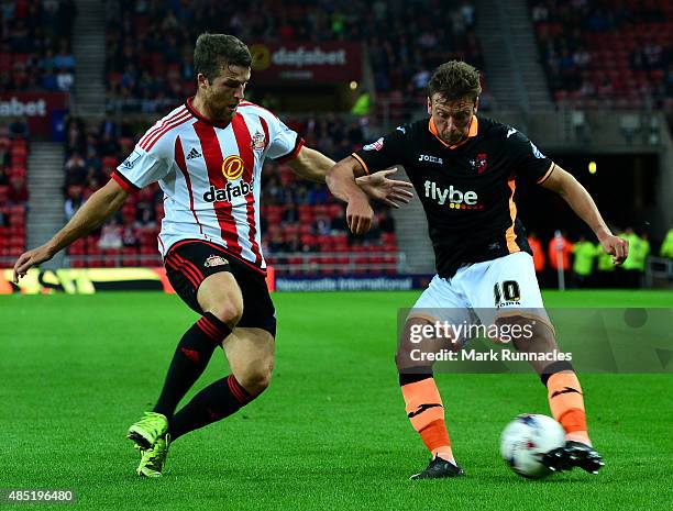 Adam Matthews of Sunderland blocks a cross from Lee Holmes of Exeter City during the Capital One Cup Second Round match between Sunderland and Exeter...