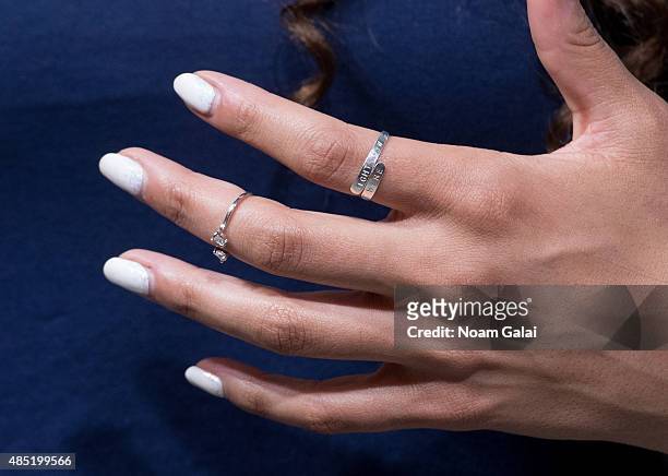 Singer Jordin Sparks, ring detail, visits 'Extra' at their New York studios at H&M in Times Square on August 25, 2015 in New York City.
