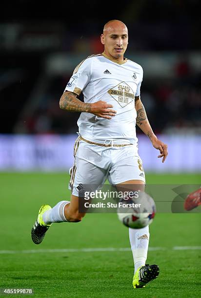 Swansea player Jonjo Shelvey in action during the Capital One Cup Second Round match between Swansea City and York City at Liberty Stadium on August...