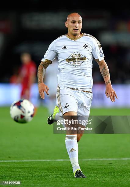 Swansea player Jonjo Shelvey in action during the Capital One Cup Second Round match between Swansea City and York City at Liberty Stadium on August...