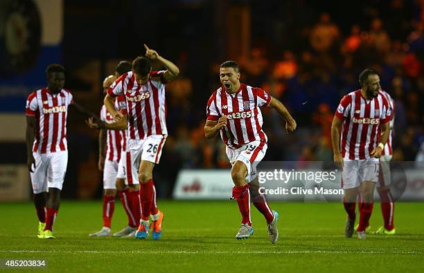 Jonathan Walters of Stoke City celebrates victory with team mates after the penalty shoot-out during the Capital One Cup second round match between...