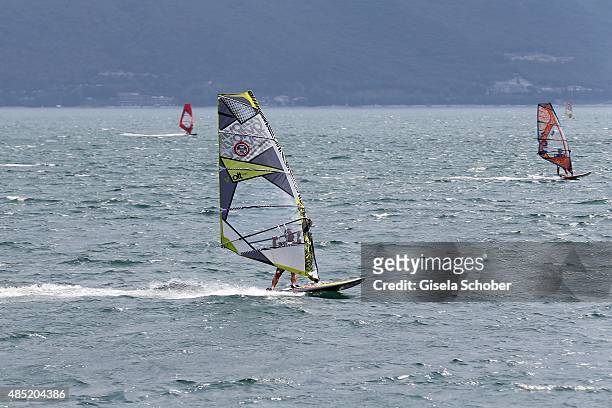 Sailboarding at Lake Garda, Hotel Pier Surf Center on August 11, 2015 in Riva del Garda, Italy.