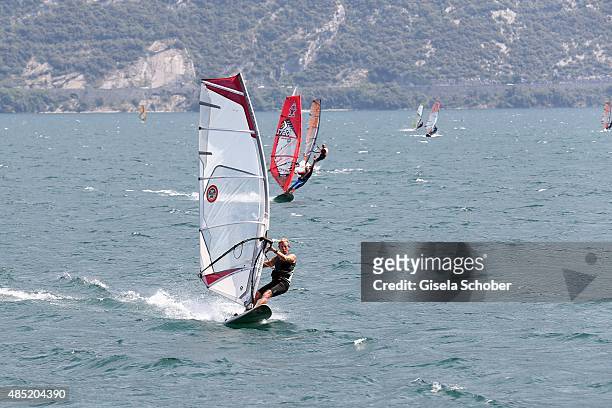 Sailboarding at Lake Garda, Hotel Pier Surf Center on August 11, 2015 in Riva del Garda, Italy.