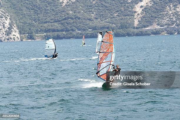 Sailboarding at Lake Garda, Hotel Pier Surf Center on August 11, 2015 in Riva del Garda, Italy.