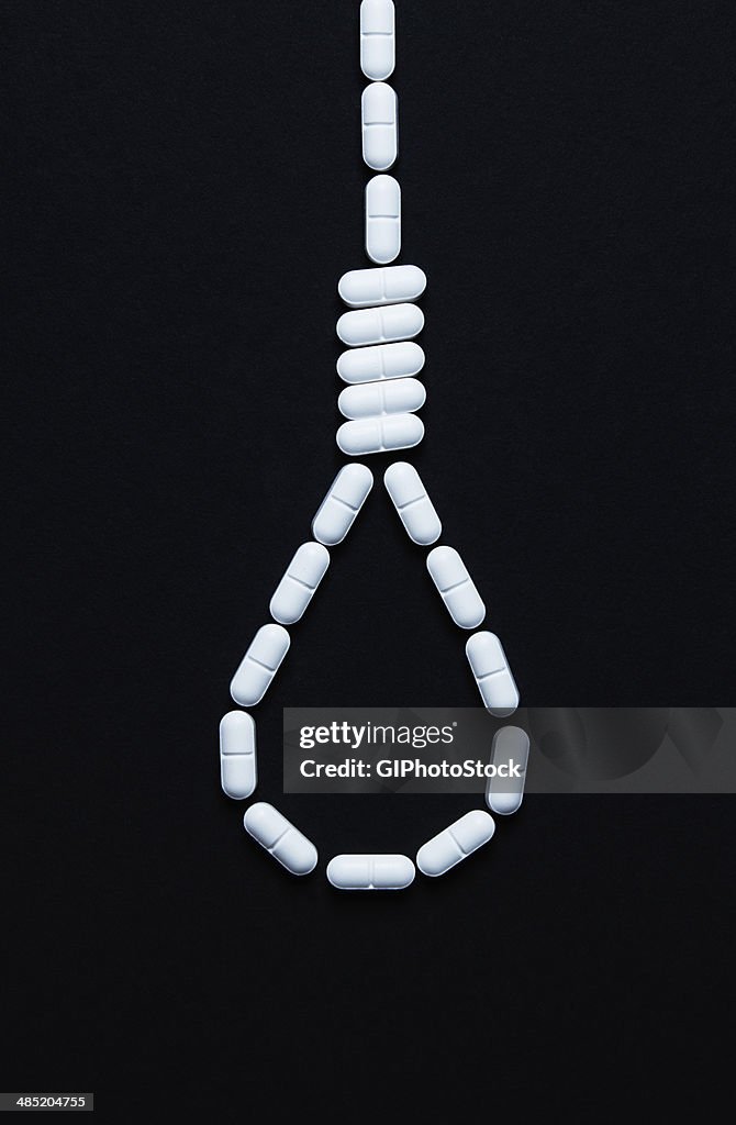 Hangman's knot made out of hydrocodone pills. Generic pills that contain 5 mg of hydrocodone and 500 mg of paracetamol (acetaminophen). This formulation is known as Vicodin and many other brand names