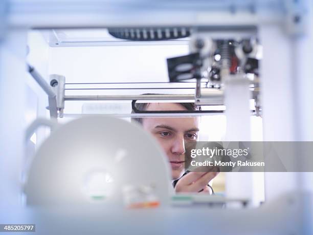 apprentice with 3d printed part, close up - cad machine stock pictures, royalty-free photos & images