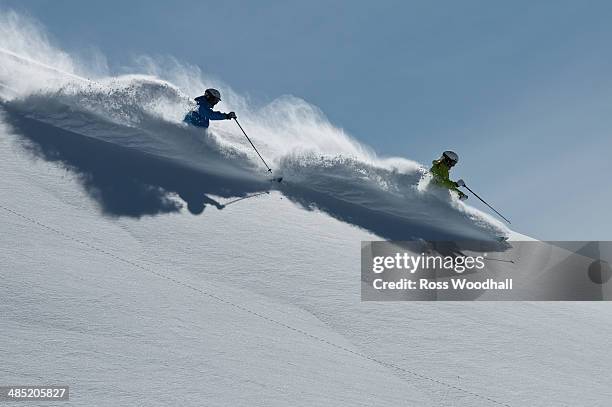 female and male skiers racing downhill, obergurgl, austria - ski race ストックフォトと画像