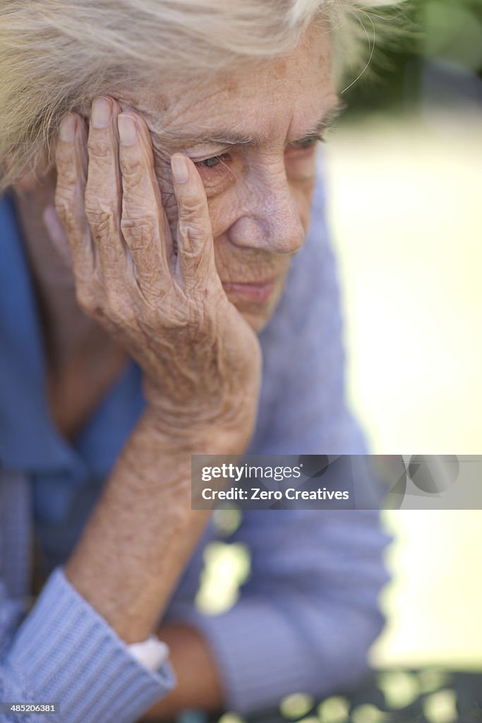 Close up of unhappy senior woman