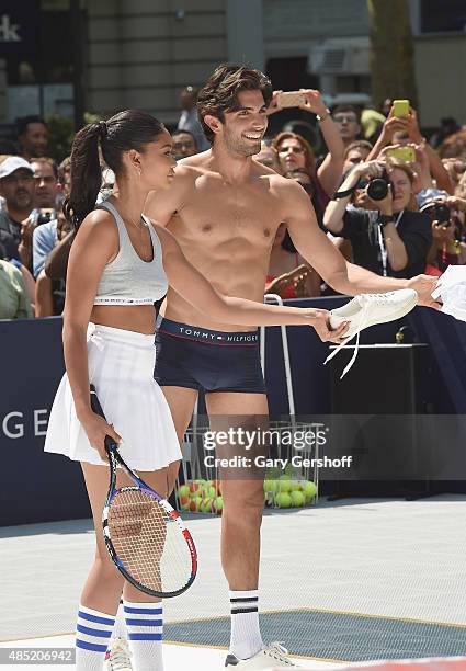 Models Chanel Iman and Akin Akman attend the Tommy Hilfiger And Rafael Nadal Launch Global Brand Ambassadorship at Bryant Park on August 25, 2015 in...