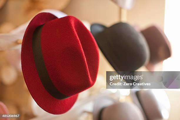 row of hats in traditional milliners shop - left out stock pictures, royalty-free photos & images