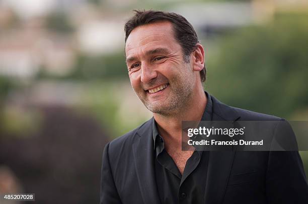 Gilles Lellouche poses during the 'Belles Familles' photocall as part of the 8th Angouleme French-Speaking Film Festival on August 25, 2015 in...