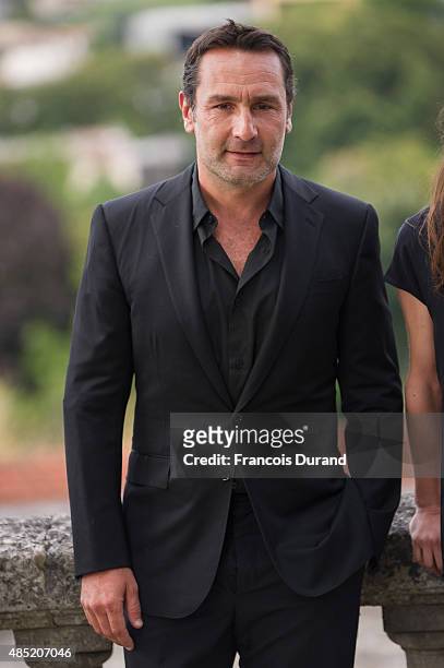 Gilles Lellouche poses during the 'Belles Familles' photocall as part of the 8th Angouleme French-Speaking Film Festival on August 25, 2015 in...