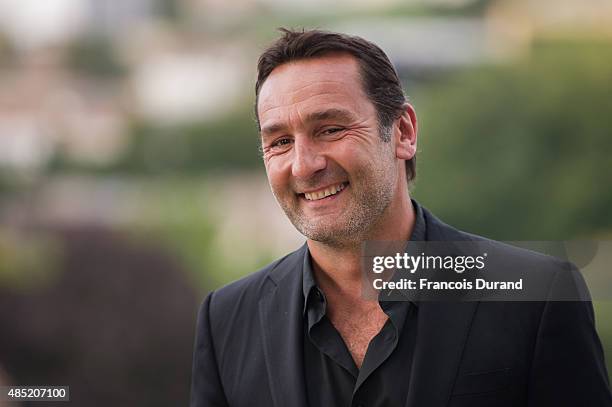 Gilles Lellouche poses during the 'Belles Familles' photocall as part of the 8th Angouleme French-Speaking Film Festival on August 25, 2015 in...