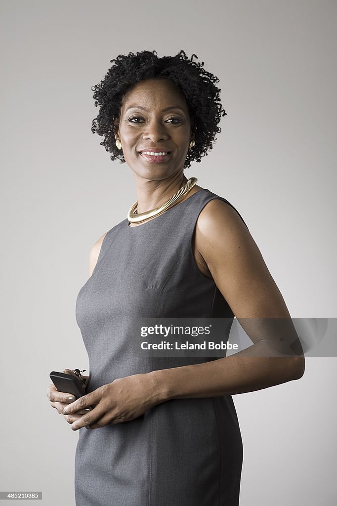 Businesswoman holding smartphone