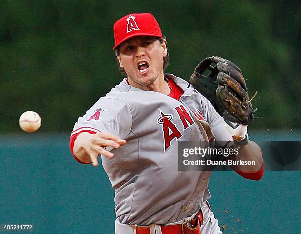 Second baseman Grant Green of the Los Angeles Angels of Anaheim throws to first base on a grounder off the bat of Anthony Gose of the Detroit Tigers...