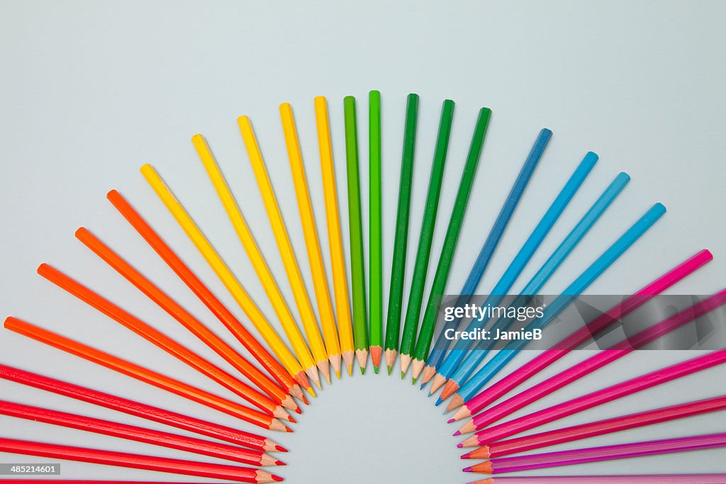 Colored Pencils arranged in semi circle