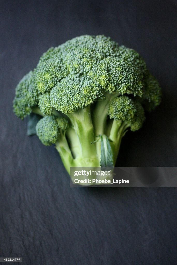 Fresh cut broccoli on table