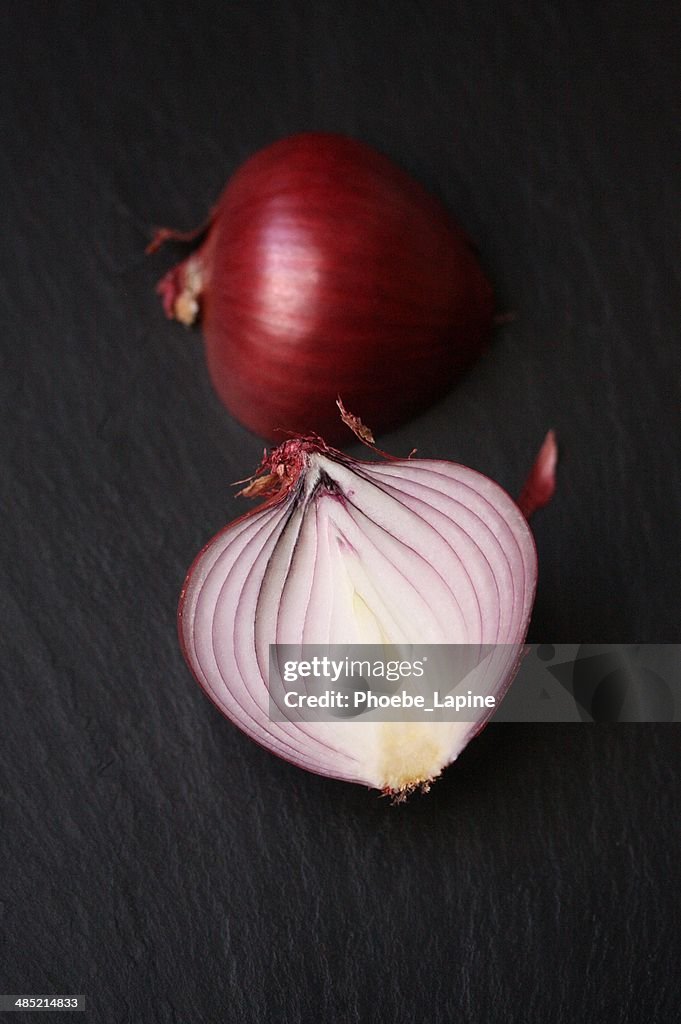 Studio shot of halved Red Onion