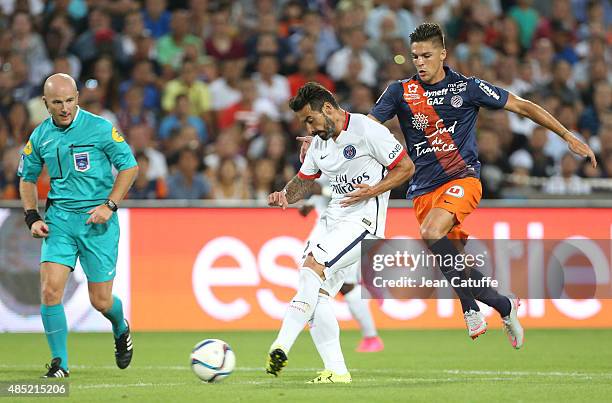 Ezequiel Lavezzi of PSG and Ramy Bensebaini of Montpellier in action during the French Ligue 1 match between Montpellier Herault SC v Paris...